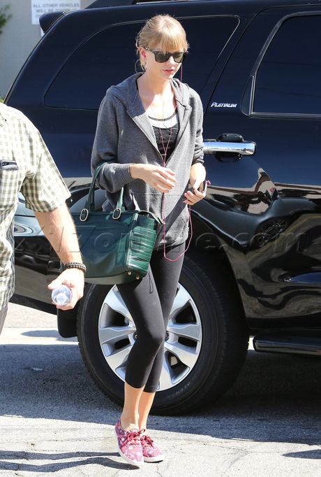 Taylor Swift  sunglasses dance purse singer musician 