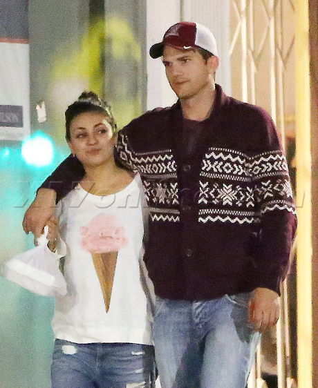Ashton Kutcher Mila Kunis jeans holding hands hat sweater Carlitos Gardel Restaurant