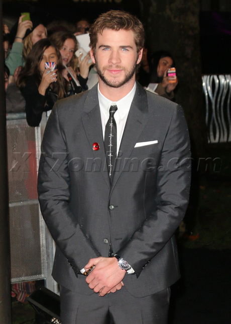 Liam Hemsworth red carpet blonde hunger games catching fire london uk dress Leicester square