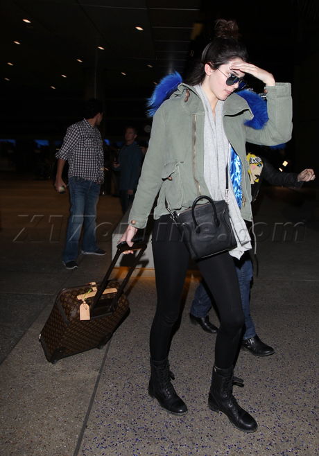 sunglasses kanye west Kendal Jenner  fur hood lax airport mirrored shades  boots 