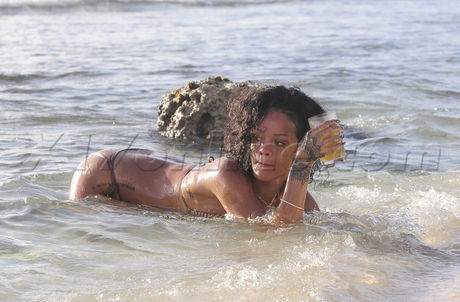 Rihanna tattoo bikini gold bikini jet ski beach barbados 