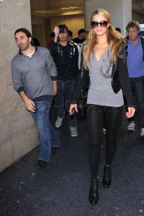 Paris Hilton boots jacket black grey sunglasses LAX 