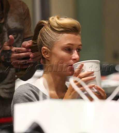 Paris Hilton blonde texting eating 