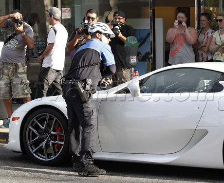 sunglasses legs snakeskin dress heels the grill parking ticket 