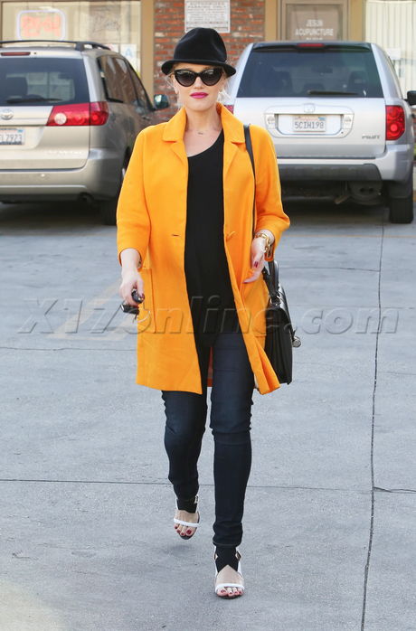 sunglasses heels strappy heels orange coat jeans pregnant 