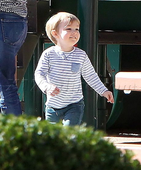 January Jones blonde sungalsses park playground los feliz stripes swing set happy 