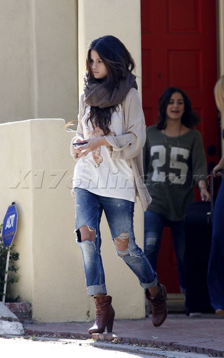 Selena Gomez scarf boots jeans