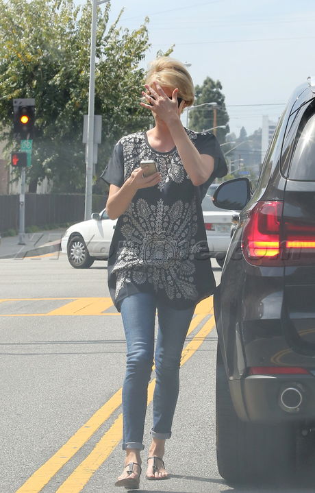 Charlize Theron  jeans sandals 