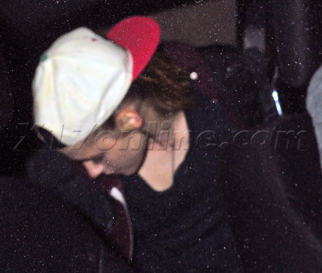 Kristen Stewart hat film car shots reading 