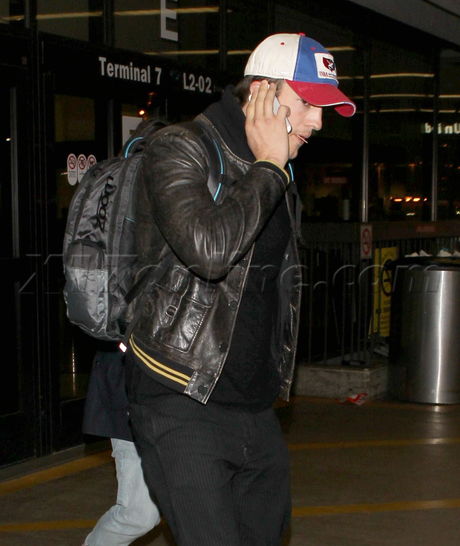 Mila Kunis Ashton Kutcher hat jacket leather airport sunglasses iowa ring engagement pregnant  