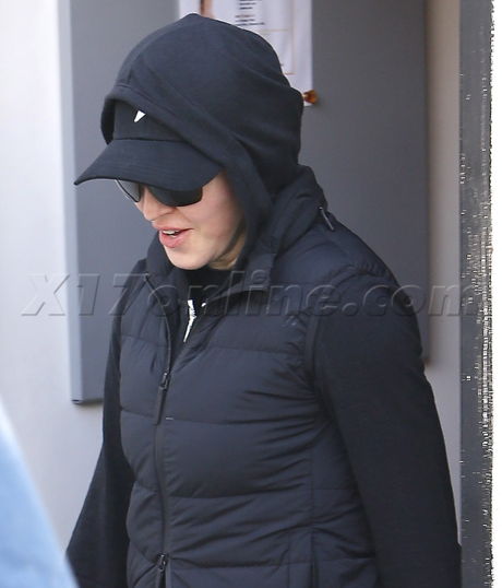 Madonna sweats pilates pressed juice hat sunglasses