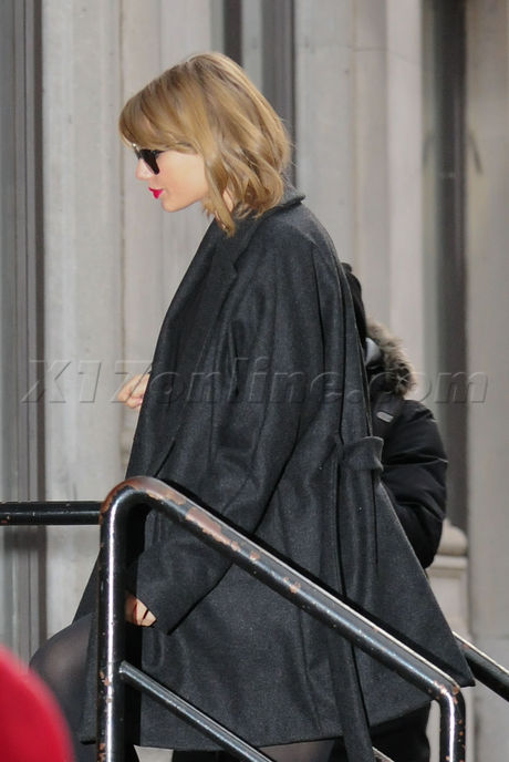 heels  Taylor Swift sunglasses 