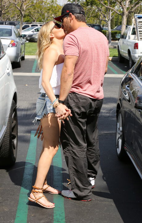 LeAnn Rimes and Eddie Cibrian tube top shorts hat kissing 
