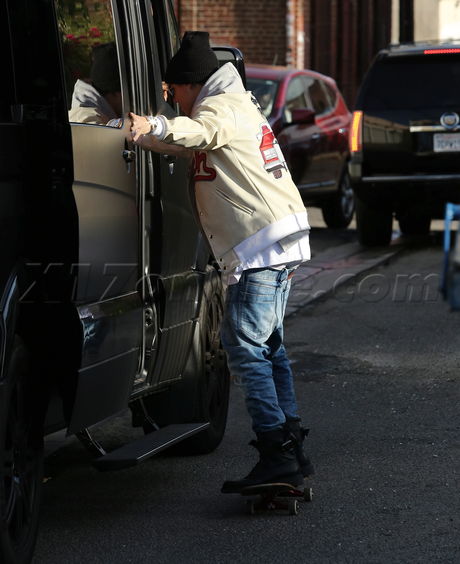 Justin Bieber Four Seasons Beverly Hills skate-hitching skitching 