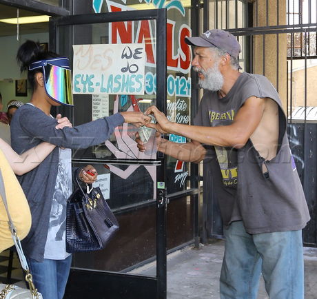 V. Stiviano visor homeless clippers scandal nail salon 