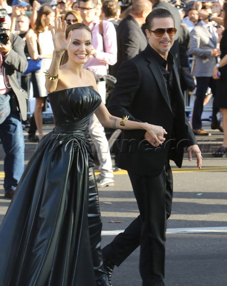 Angelina Jolie and Brad Pitt Premiere Maleficent black gown suit