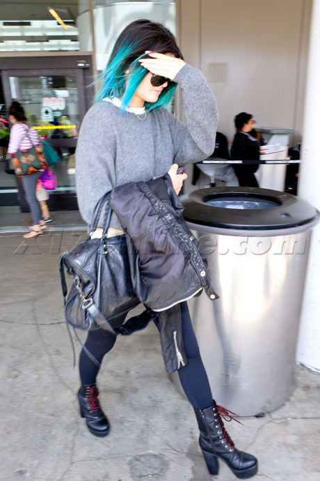 Kendall Jenner and Kylie Jenner  heels blazer sunglasses 