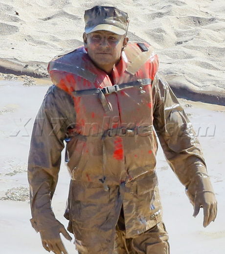 sunglasses body filming clint eastwood american sniper beach army mud dirty 