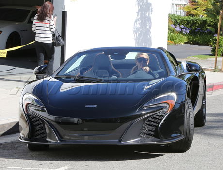 McLaren leather maxi dress car Paris Hilton sunglasses 